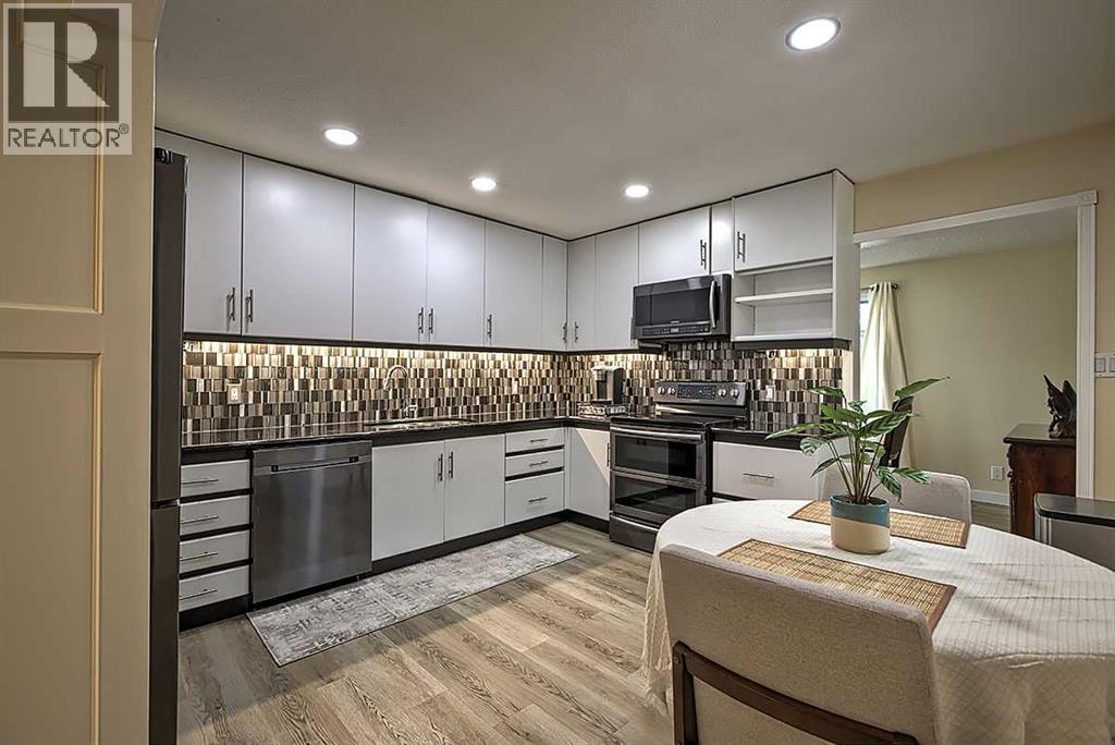 48 Deermont Way SE, Calgary, Alberta  T2J 5P3 - Photo 2 - A2313135