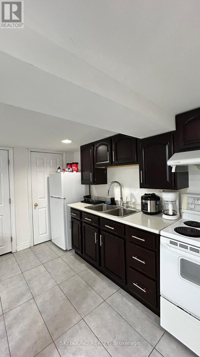 Lower - 8 Runnymede Road, Toronto, Ontario  M6S 2Y2 - Photo 3 - W13185962