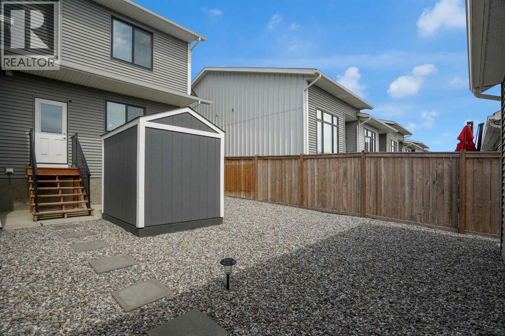 59 D'arcy Boulevard, Okotoks, Alberta  T1S 5S6 - Photo 45 - A2314595