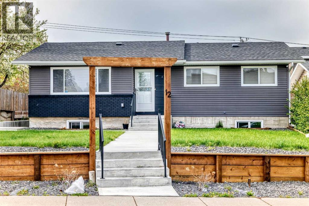 12 Rundleson Way Ne, Calgary, Alberta  T1Y 3N6 - Photo 1 - A2314154