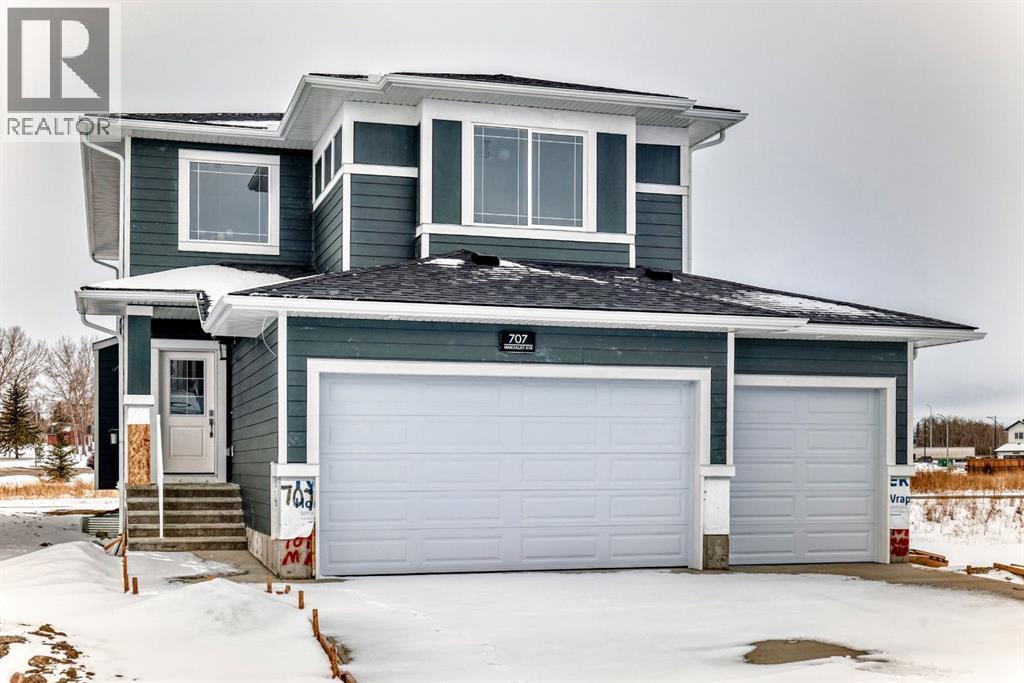 707 Mandalay Avenue, Carstairs, Alberta  T0M 0N0 - Photo 1 - A2292567