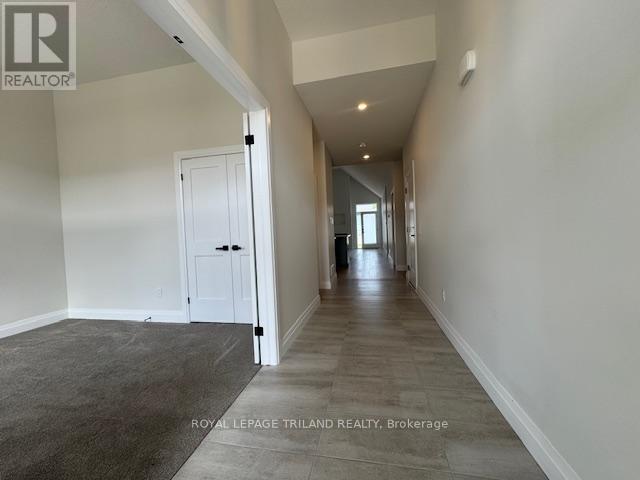 49 - 63 Compass Trail, Central Elgin, Ontario  N5L 0B4 - Photo 3 - X13202582