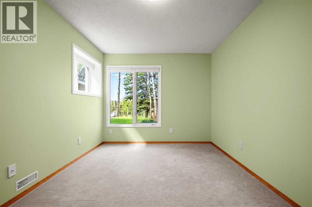15 Sunrise Way, Priddis Greens, Alberta  T0L 1W3 - Photo 31 - A2313961