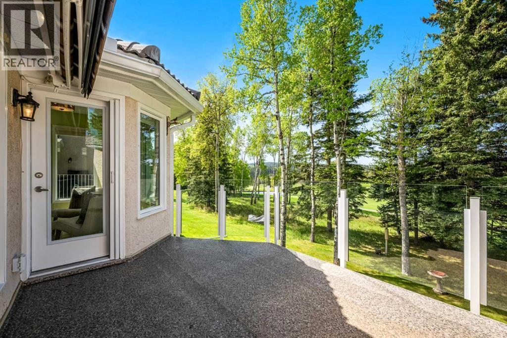 15 Sunrise Way, Priddis Greens, Alberta  T0L 1W3 - Photo 37 - A2313961