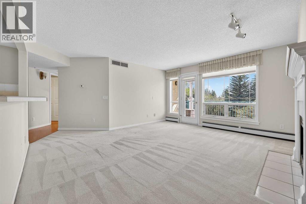310, 9449 19 Street Sw, Calgary, Alberta  T2V 5J8 - Photo 6 - A2314448