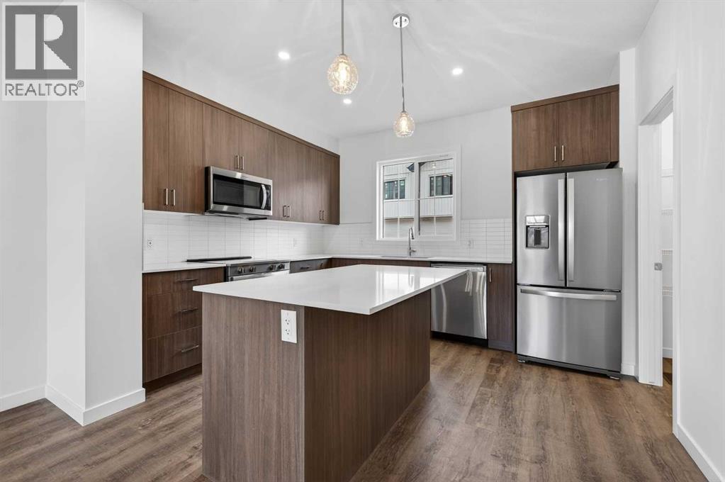 56 Creekside Drive SW, Calgary, Alberta  T2X 6E2 - Photo 1 - A2311243