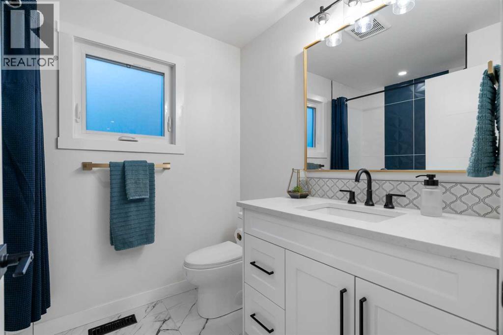 128 Lake Moraine Place Se, Calgary, Alberta  T2J 2Y7 - Photo 28 - A2315237