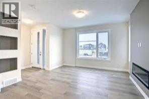 253 Cobblestone Gate SW, Airdrie, Alberta  T4B 0R7 - Photo 4 - A2283060