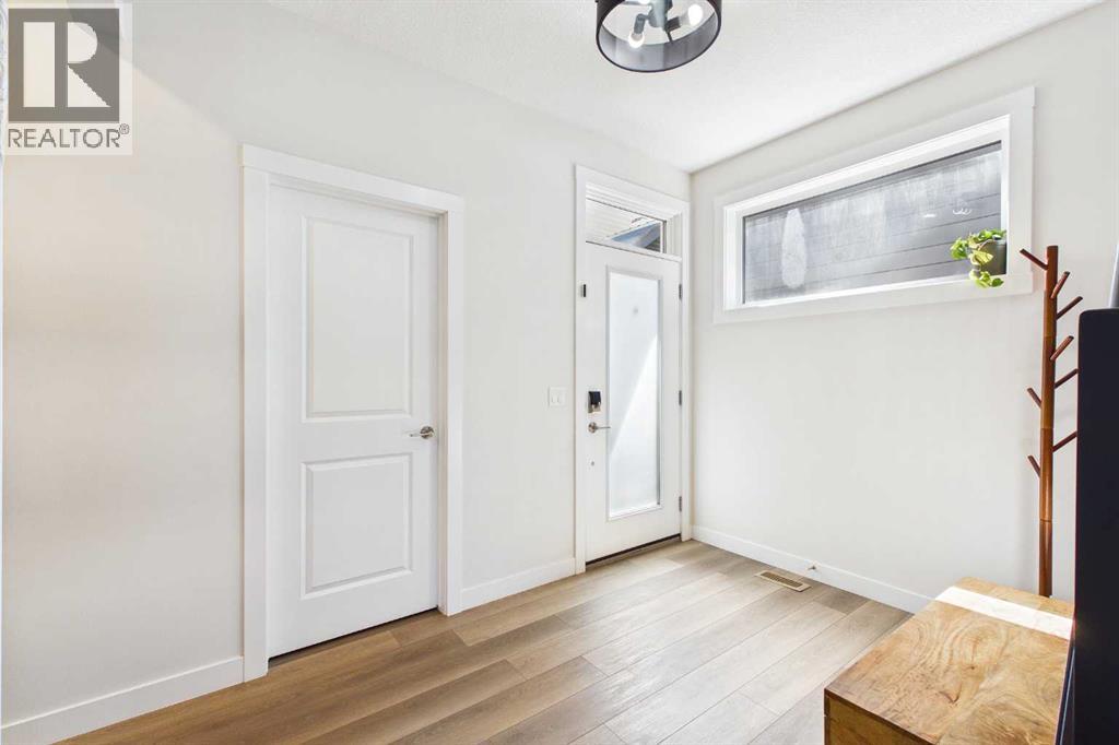 59 Royston Rise Nw, Calgary, Alberta  T3L 0K1 - Photo 3 - A2312618