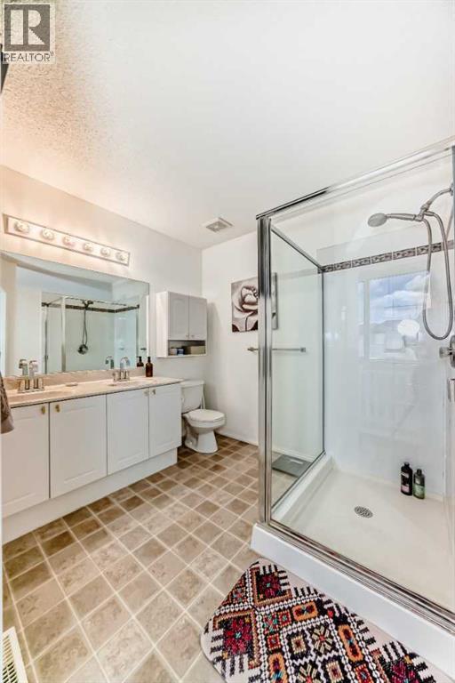 153 Cougarstone Place Sw, Calgary, Alberta  T3H 4W8 - Photo 15 - A2312795
