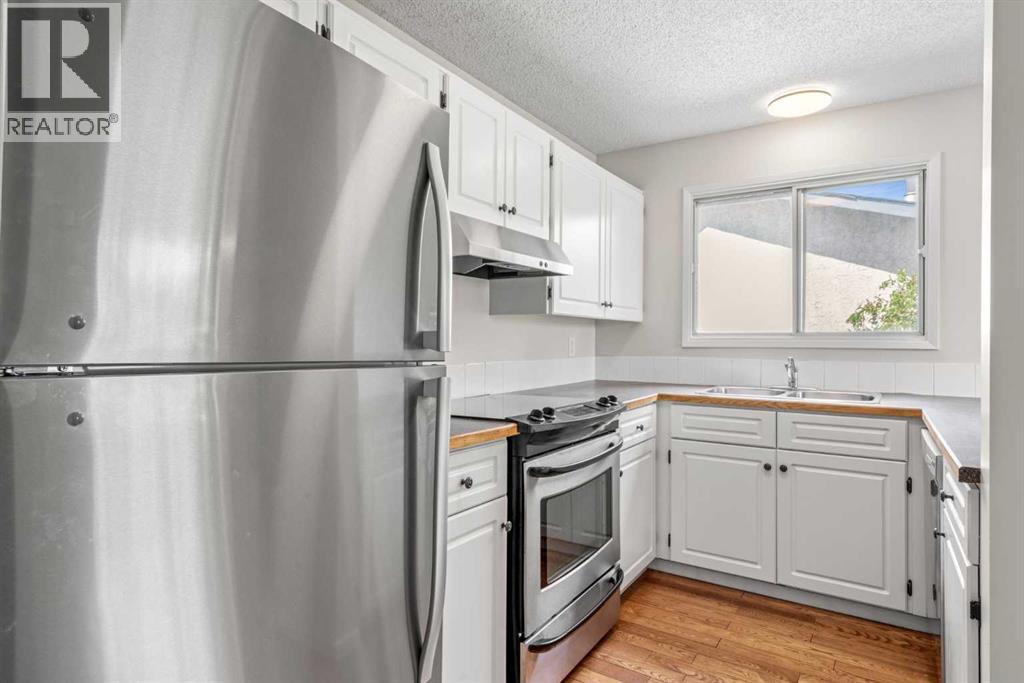 124 Bergen Crescent Nw, Calgary, Alberta  T3K 1J8 - Photo 4 - A2313891