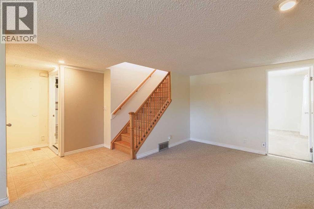 48 Ranchridge Drive NW, Calgary, Alberta  T3G 1W2 - Photo 23 - A2307501