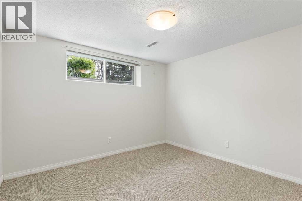 14 Montrose Crescent Ne, Calgary, Alberta  T2E 5N9 - Photo 38 - A2315439