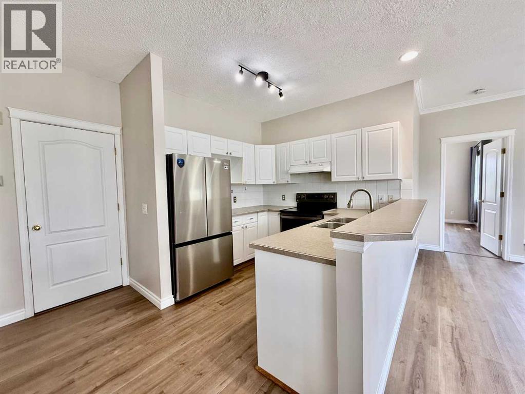102 Prestwick Gardens SE, Calgary, Alberta  T2Z 3V4 - Photo 9 - A2311787