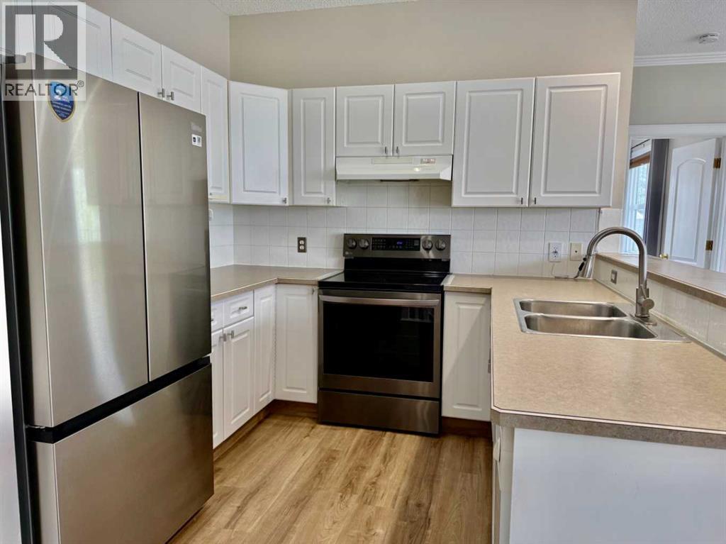 102 Prestwick Gardens SE, Calgary, Alberta  T2Z 3V4 - Photo 11 - A2311787