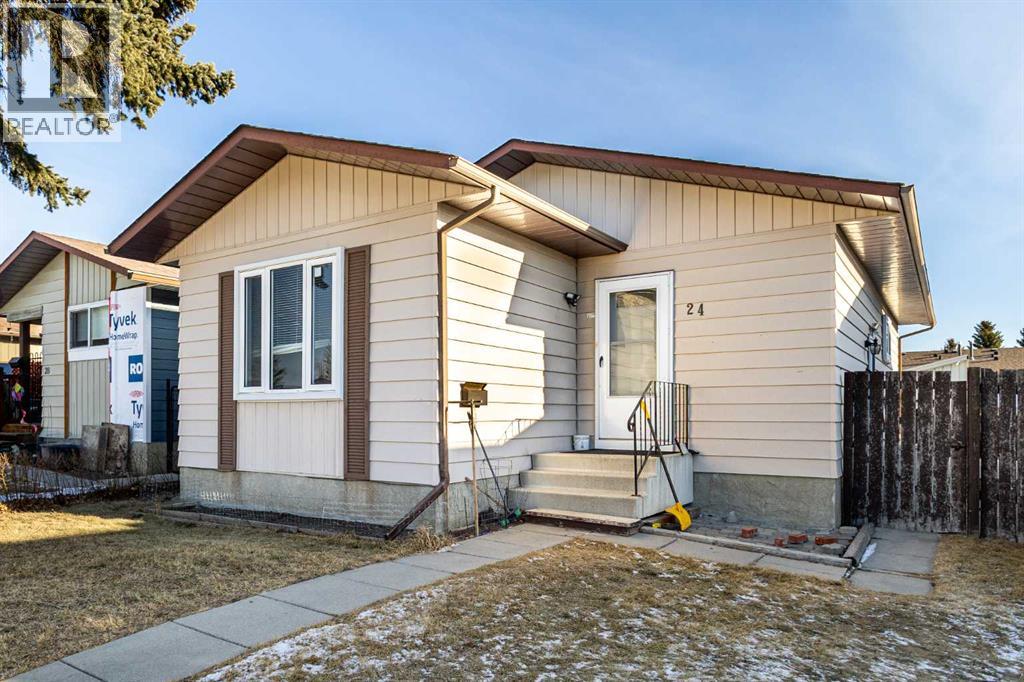 24 Bedford Road NE, Calgary, Alberta  T3K 2K8 - Photo 1 - A2295401