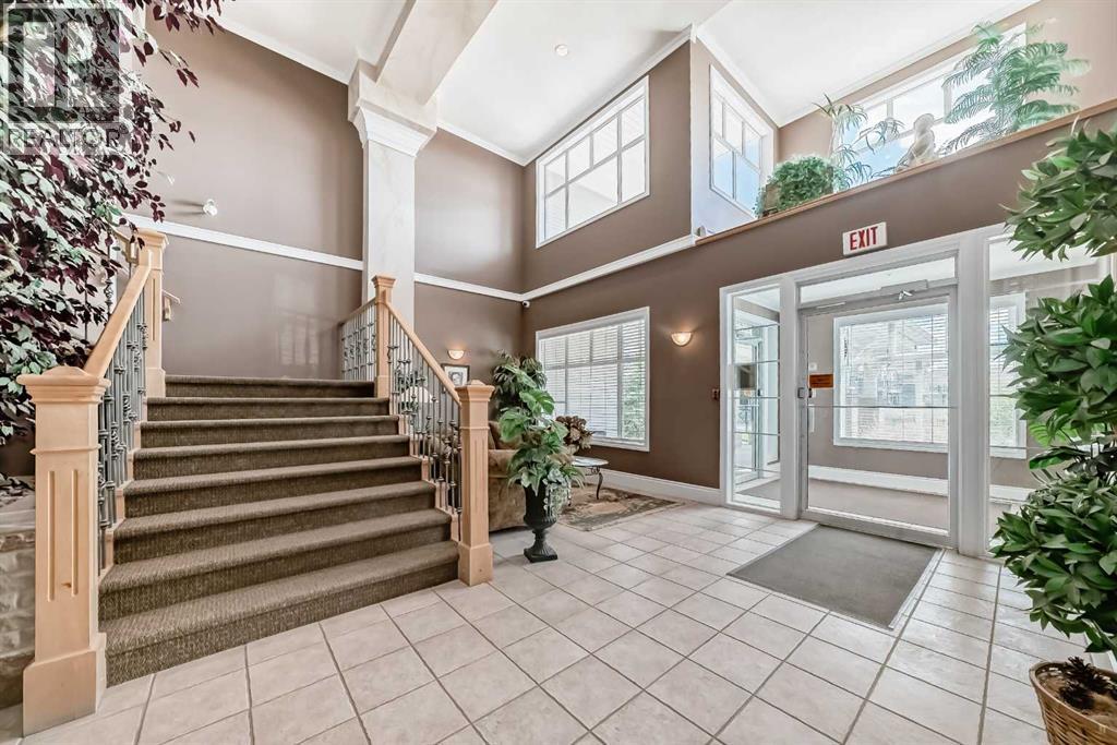 1209, 1010 Arbour Lake Road Nw, Calgary, Alberta  T3G 4Y8 - Photo 4 - A2313903