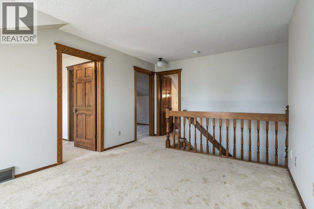 152 Coach Grove Place Sw, Calgary, Alberta  T3H 1J2 - Photo 25 - A2311820