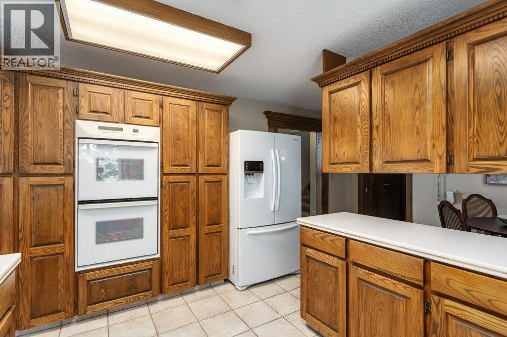 152 Coach Grove Place Sw, Calgary, Alberta  T3H 1J2 - Photo 12 - A2311820