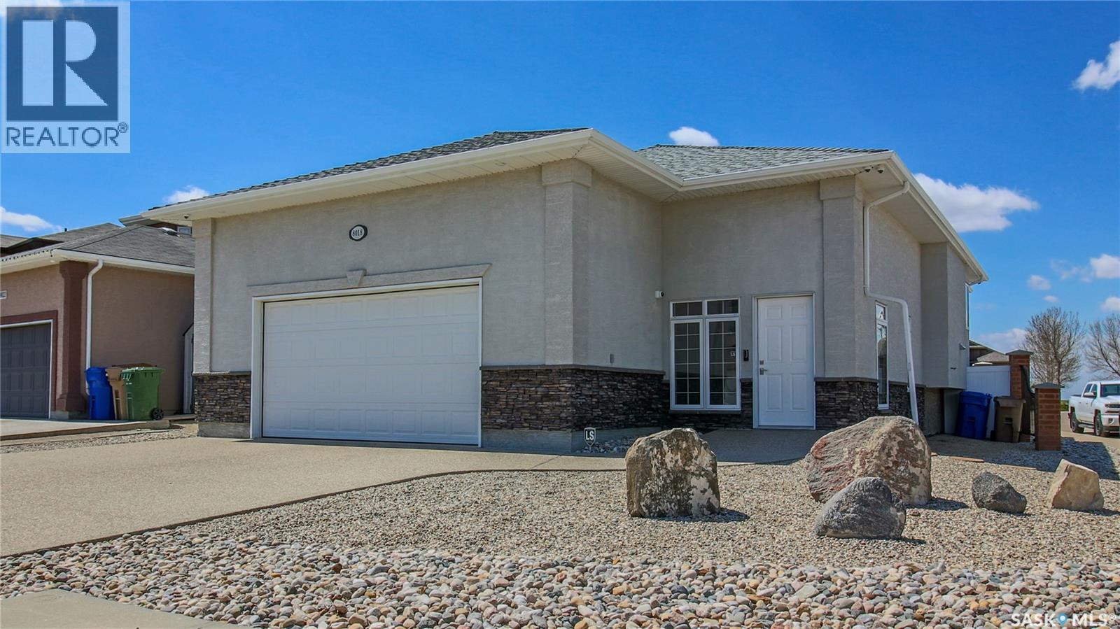 8018 Fairways West Drive, Regina, Saskatchewan  S4Y 0A5 - Photo 1 - SK037396