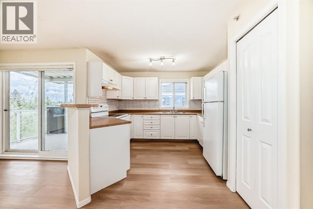1302, 2280 68 Street NE, Calgary, Alberta  T1Y 7M1 - Photo 6 - A2311215