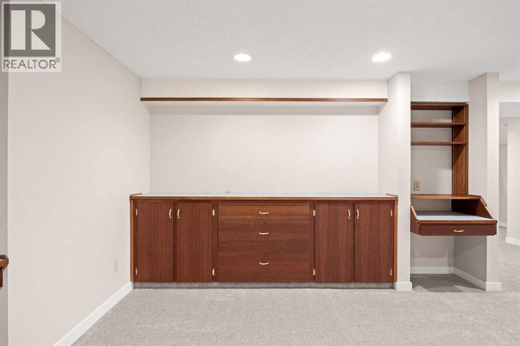 7720 Hunterquay Road NW, Calgary, Alberta  T2K 4T8 - Photo 32 - A2308100