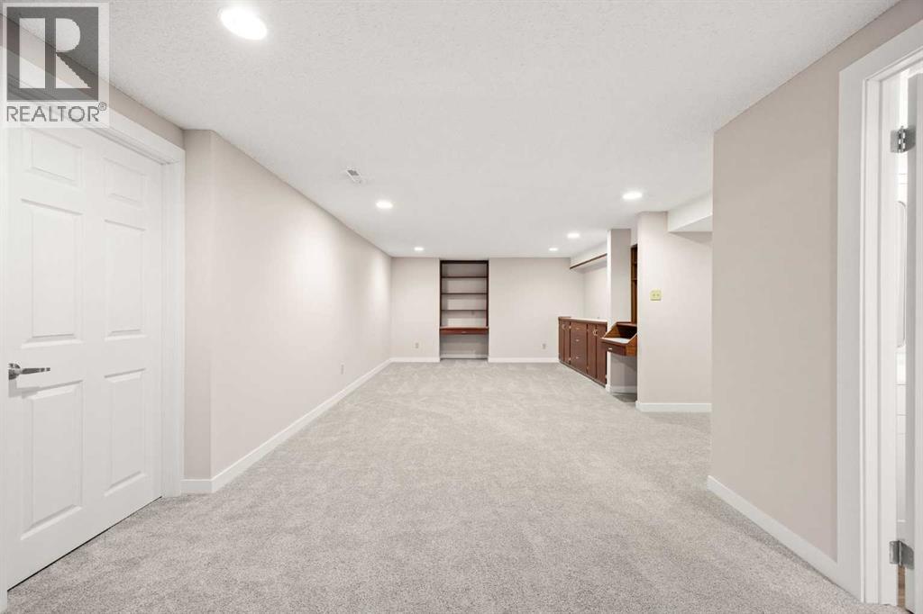 7720 Hunterquay Road NW, Calgary, Alberta  T2K 4T8 - Photo 34 - A2308100