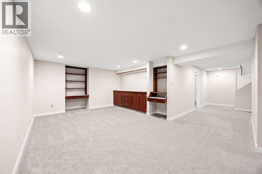 7720 Hunterquay Road NW, Calgary, Alberta  T2K 4T8 - Photo 30 - A2308100