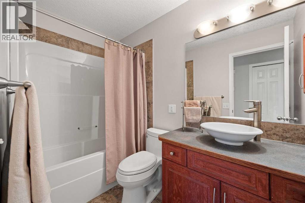 7720 Hunterquay Road NW, Calgary, Alberta  T2K 4T8 - Photo 21 - A2308100