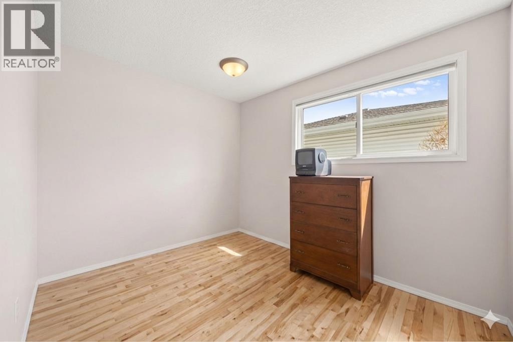 7720 Hunterquay Road NW, Calgary, Alberta  T2K 4T8 - Photo 27 - A2308100
