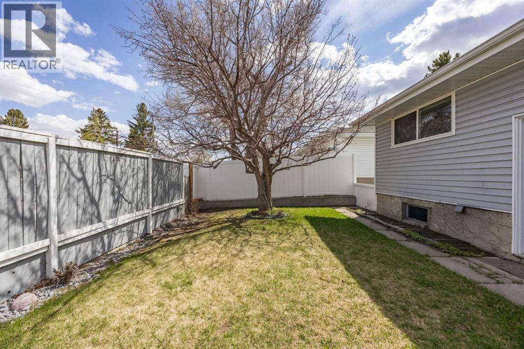 7720 Hunterquay Road NW, Calgary, Alberta  T2K 4T8 - Photo 41 - A2308100