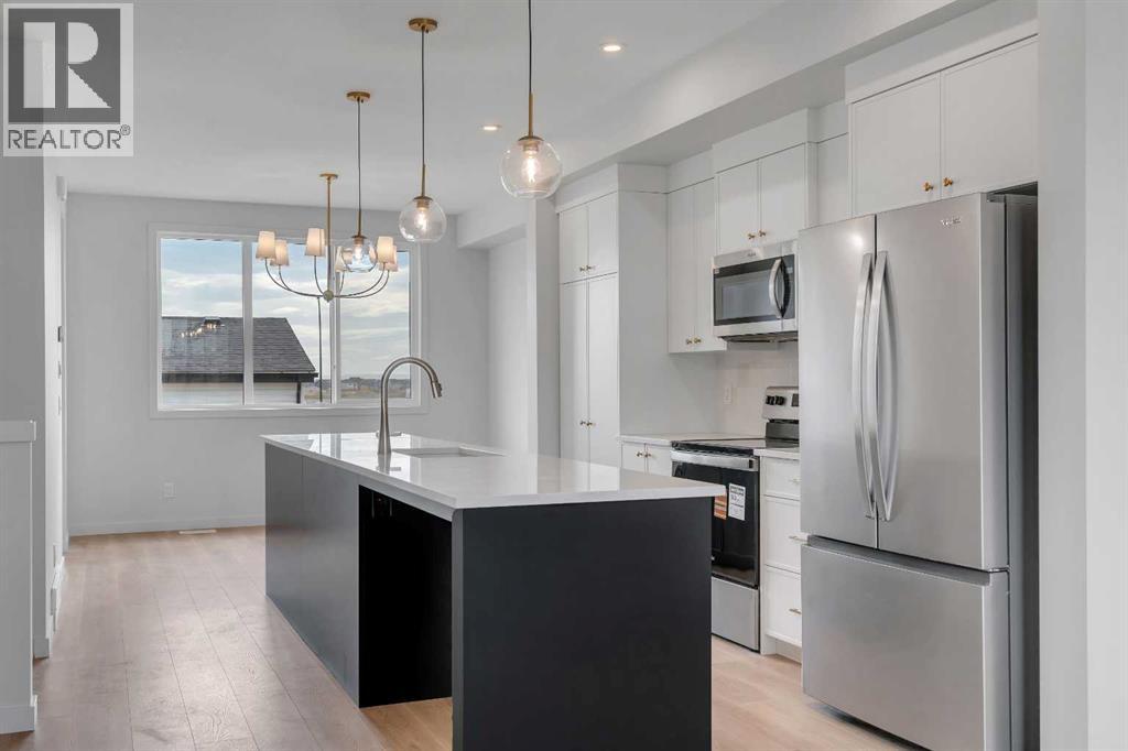 1497 Rangeview Drive SE, Calgary, Alberta  T3S 0K5 - Photo 7 - A2261439