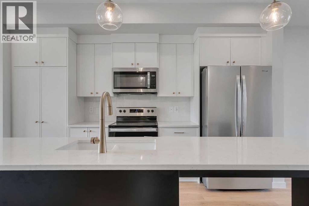 1497 Rangeview Drive SE, Calgary, Alberta  T3S 0K5 - Photo 9 - A2261439
