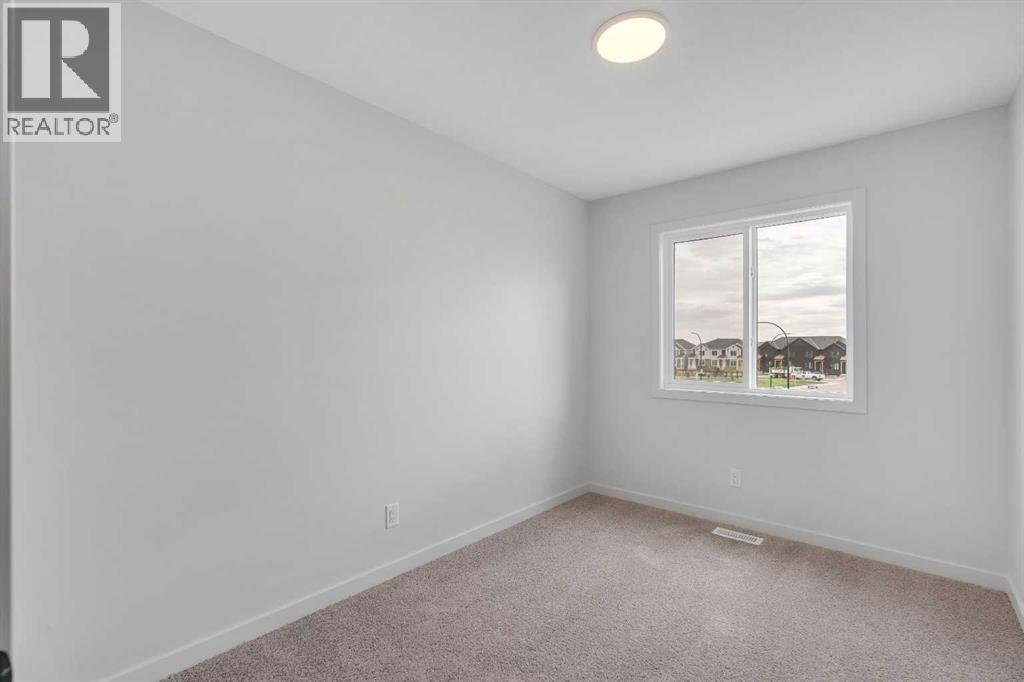 1497 Rangeview Drive SE, Calgary, Alberta  T3S 0K5 - Photo 25 - A2261439