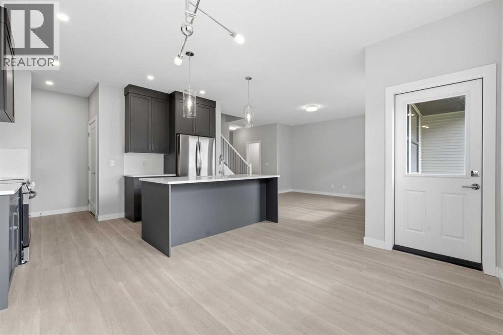 902, 201 Cooperswood Green Sw, Airdrie, Alberta  T3B 3Y6 - Photo 10 - A2314590
