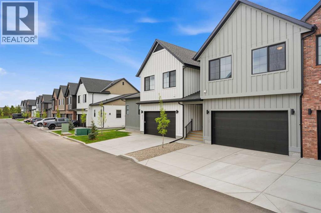 902, 201 Cooperswood Green Sw, Airdrie, Alberta  T3B 3Y6 - Photo 2 - A2314590
