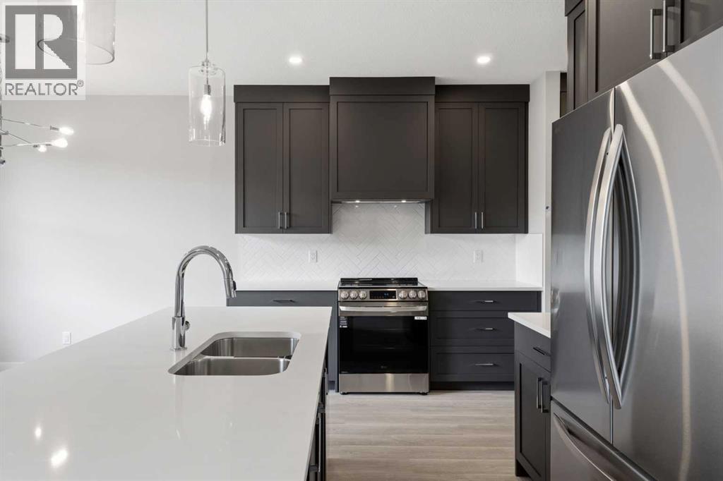 902, 201 Cooperswood Green Sw, Airdrie, Alberta  T3B 3Y6 - Photo 12 - A2314590