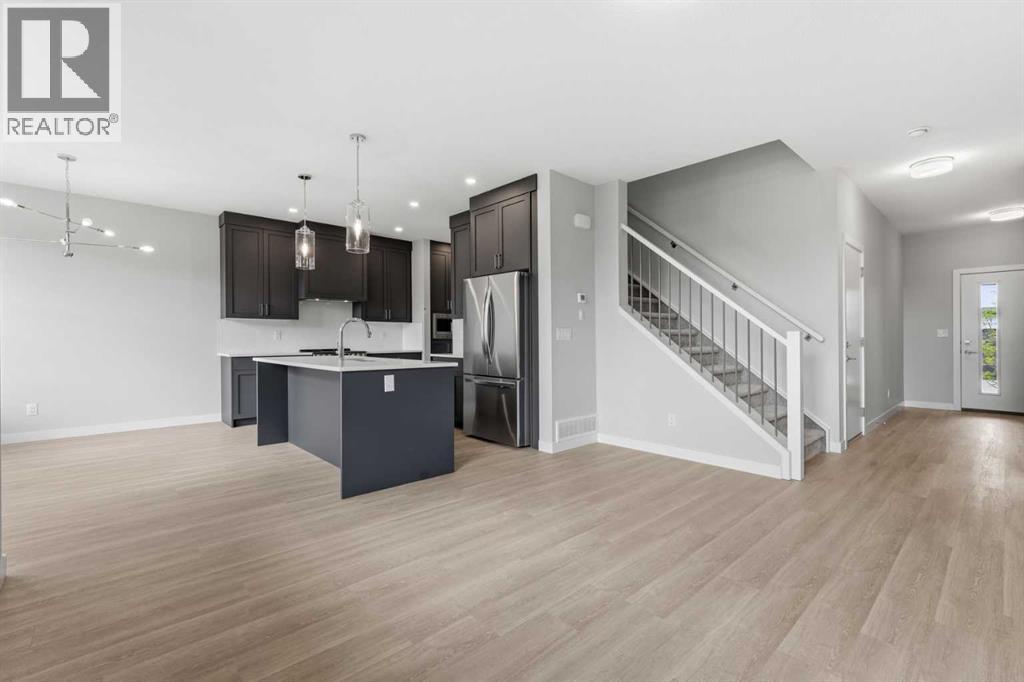 902, 201 Cooperswood Green Sw, Airdrie, Alberta  T3B 3Y6 - Photo 9 - A2314590