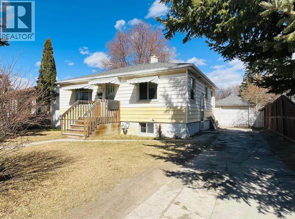 428 32 Avenue NW, Calgary, Alberta  T2M 2P9 - Photo 1 - A2296869