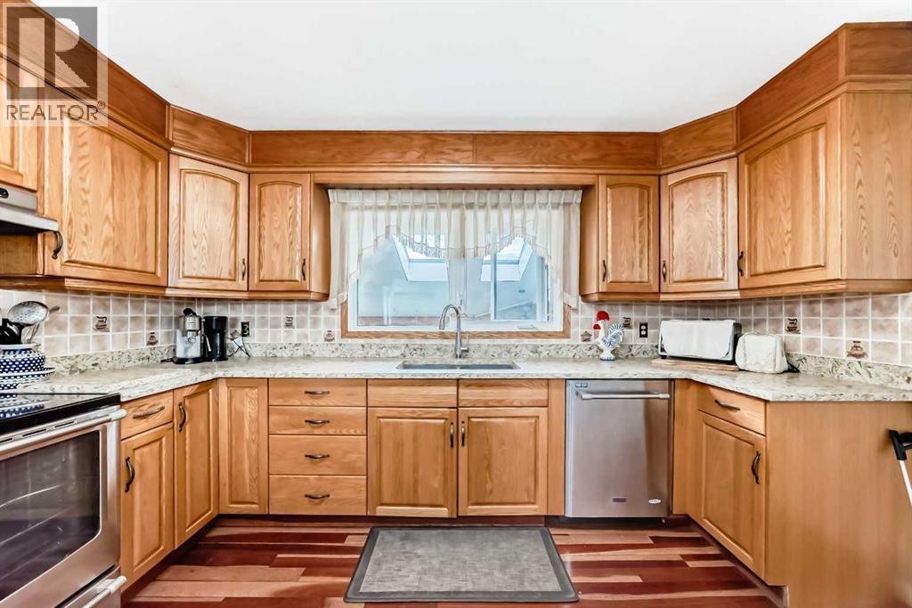 247 Huntford Way NE, Calgary, Alberta  T2K 3Z9 - Photo 4 - A2309815