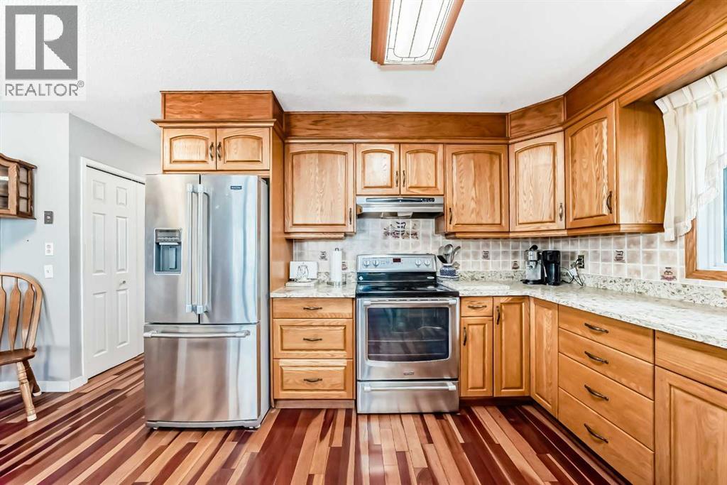 247 Huntford Way NE, Calgary, Alberta  T2K 3Z9 - Photo 7 - A2309815
