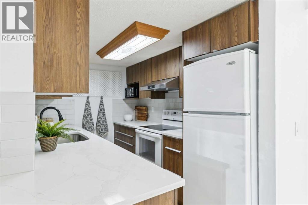 72, 1055 72 Avenue NW, Calgary, Alberta  T2K 5S4 - Photo 8 - A2312049