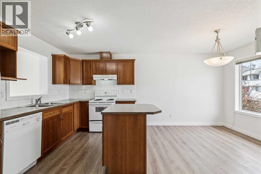 86 Crystal Shores Cove, Okotoks, Alberta  T1S 2B4 - Photo 21 - A2312641