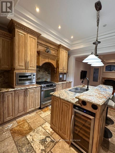 81 Livingstone Avenue, Toronto, Ontario  M6E 2L7 - Photo 6 - W13208668
