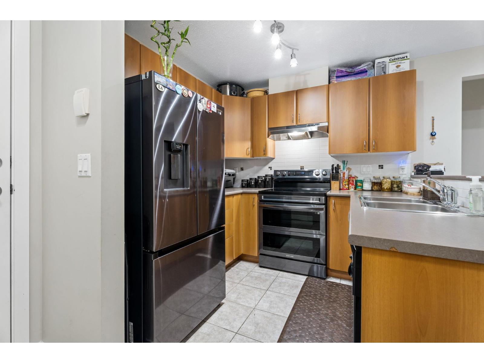 203 14885 105 Avenue, Surrey, British Columbia  V3R 2V6 - Photo 6 - R3129232