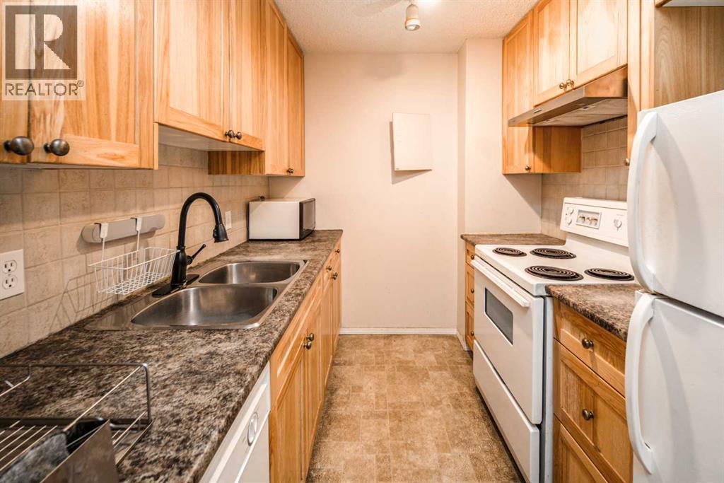 1204, 4944 Dalton Drive Nw, Calgary, Alberta  T3A 2E6 - Photo 4 - A2305116