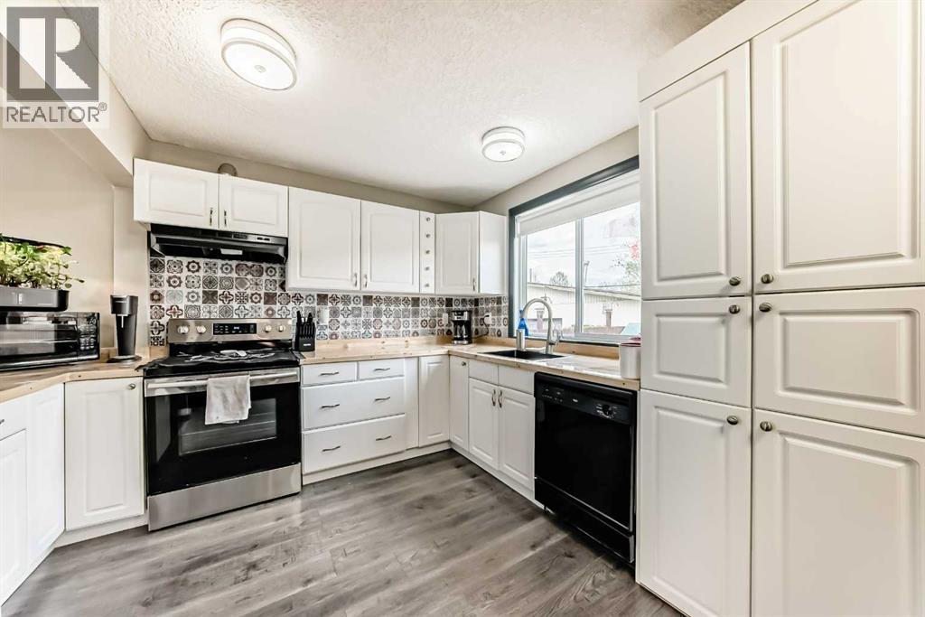 3014 Doverville Crescent Se, Calgary, Alberta  T2B 1T9 - Photo 12 - A2311619