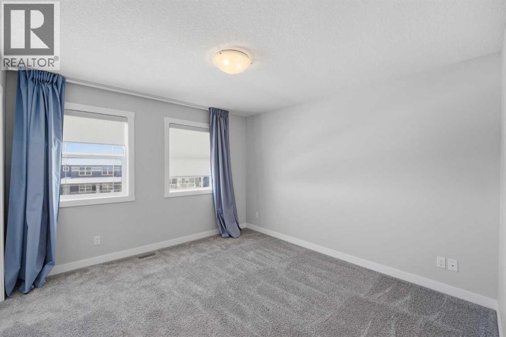 125 Edith Gate NW, Calgary, Alberta  T3R 1Z2 - Photo 21 - A2295954