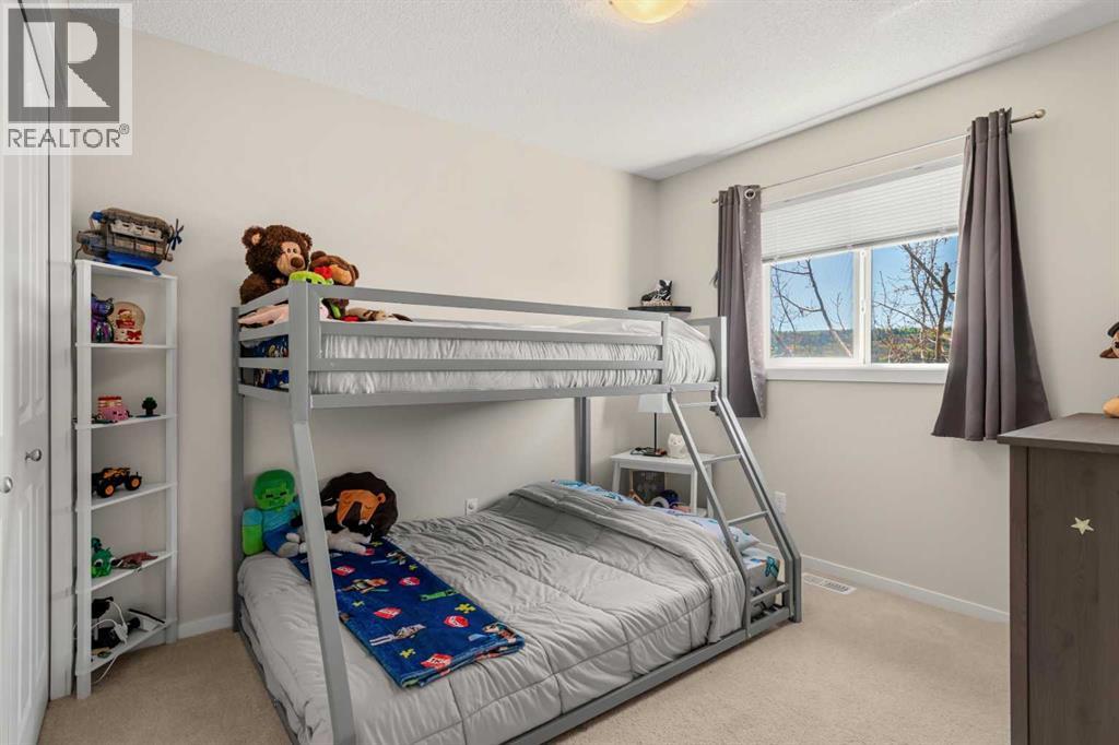 40 Sunvalley Road, Cochrane, Alberta  T4C 0X6 - Photo 20 - A2312593