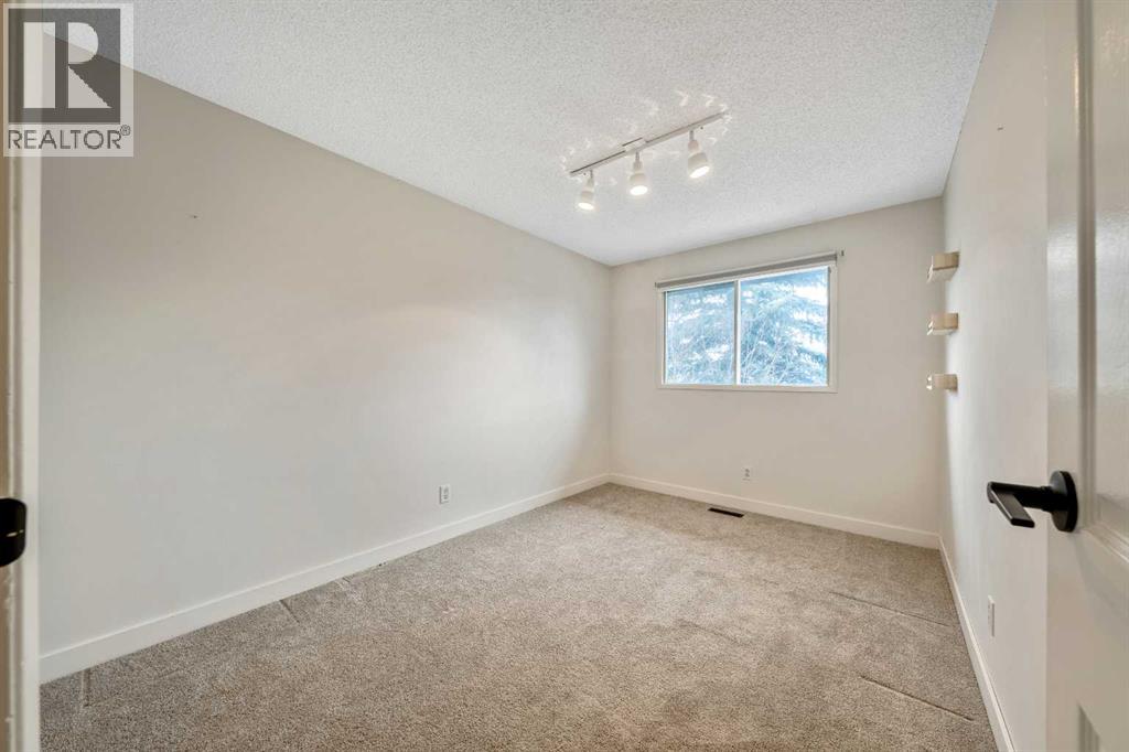 100 Woodfield Green SW, Calgary, Alberta  T2W 3T9 - Photo 47 - A2315615